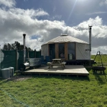 exterior of yurt and outside area.